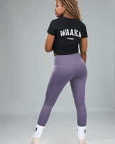 Person wearing a black &