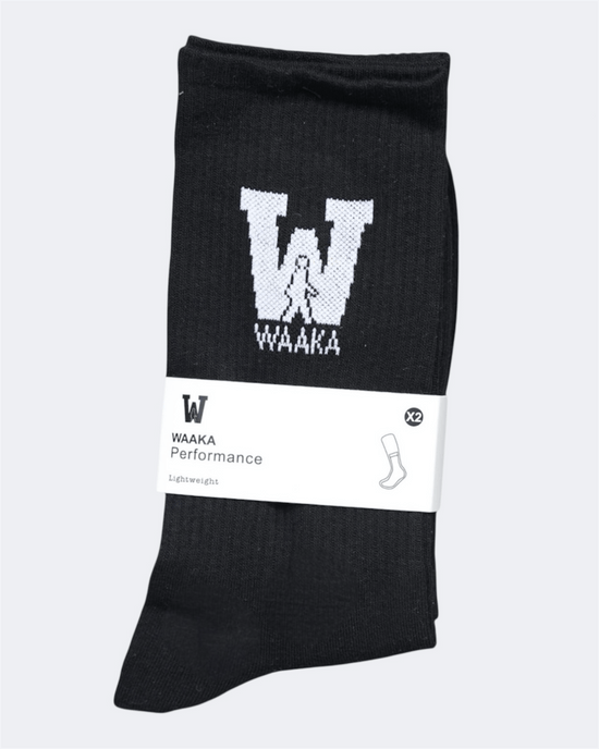 Black sock with WAAKA logo and text on a white background