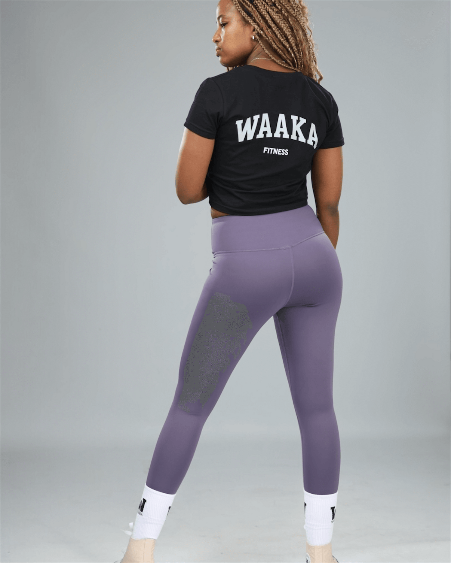 Person wearing a black &